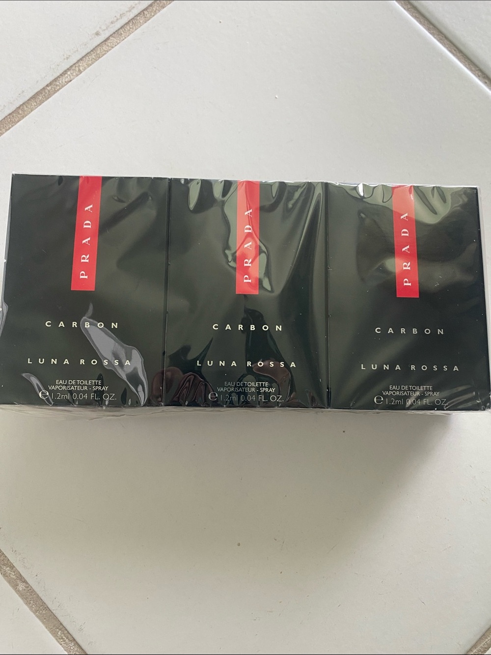 Prada Luna Rossa Carbon .04 oz  Mini EDT 12 pcs fragrance- Black with Red Accent
